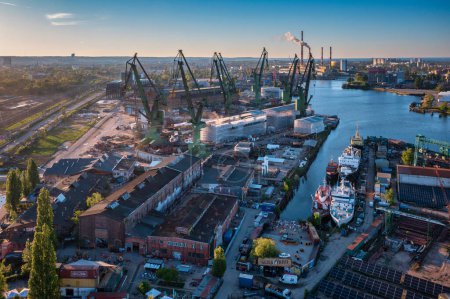 Photo for Gdansk, Poland - May 7, 2024: Shipyard areas in Gdansk at sunset. Poland - Royalty Free Image