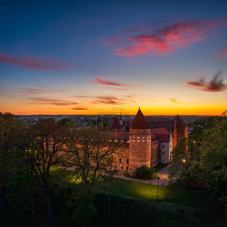 Photo for Aerial scenery with the Teutonic Castle in Bytow, a former stronghold for Pomeranian dukes at sunset. Poland - Royalty Free Image