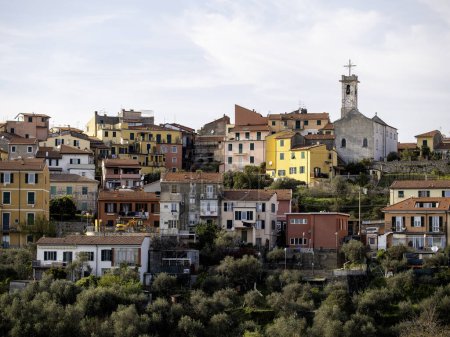 Photo for Pitelli. Pitelli, village of La Spezia. Panorama of the village on the hill between the shipyards and the ENEL industrial area. - Royalty Free Image