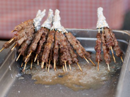 A typical central Italy dish: lamb "arrosticini". They are thin skewers of mutton cooked on the grill