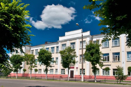 Photo for KLINTSY, RUSSIA - JULY 01, 2012: Avenue named after Lenin. The building of school number one named after Gagarin. - Royalty Free Image