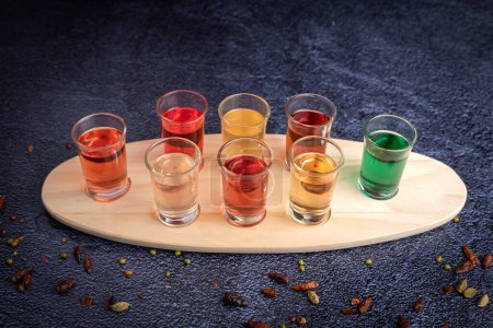 Photo for Different glasses of shooter alchool for aperitive or festive situation - Royalty Free Image