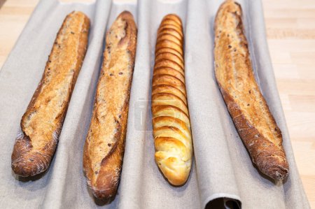 Foto de Tasted and fresh beautiful bread named french baguette - Imagen libre de derechos