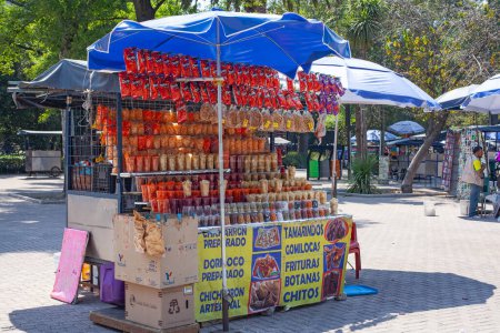 Photo for MEXICO CITY, MEXICO. March 24, 2022: Treats stand with batanas, chips, maxican snacks n Chapultepec park, Mexico City, Mexico, - Royalty Free Image