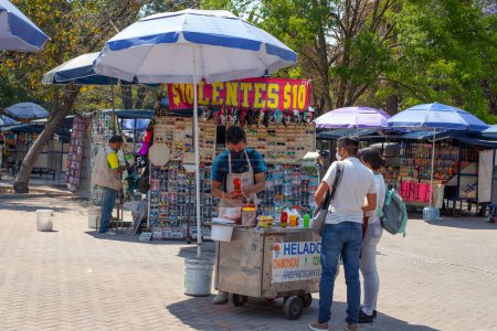 Foto de MEXICO CITY, MEXICO. March 24, 2022: Treats stand with batanas, chips, maxican snacks n Chapultepec park, Mexico City, Mexico, - Imagen libre de derechos