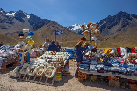 Photo for PERU - April 30, 2022: Souvenirs store on the view point in Andes Mountains on the way from Puno to Cusco, Peru - Royalty Free Image