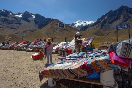 Photo for PERU - April 30, 2022: Souvenirs store on the view point in Andes Mountains on the way from Puno to Cusco, Peru - Royalty Free Image
