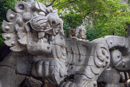 Photo for Tiger statues in The town park of pound water, the famous "Black Tiger Spring" in Jinan. - Royalty Free Image