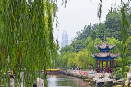 Photo for Jinan, Shandong, China -  29 June 2023:  The town park of pound water, the famous "Black Tiger Spring" in Jinan. - Royalty Free Image