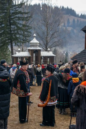 Photo for Kryvorivnya, UUkraine - JANUARY 6, 2023: Gutsuls (highlanders in Carpathian mountains) are singing Christmas Carols (Kolyadki)  in Kryvorivnya, Ukraine. - Royalty Free Image