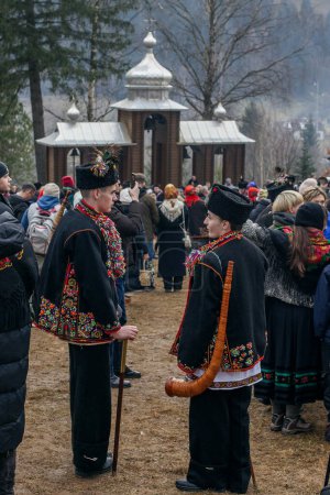 Photo for Kryvorivnya, UUkraine - JANUARY 6, 2023: Gutsuls (highlanders in Carpathian mountains) are singing Christmas Carols (Kolyadki)  in Kryvorivnya, Ukraine. - Royalty Free Image
