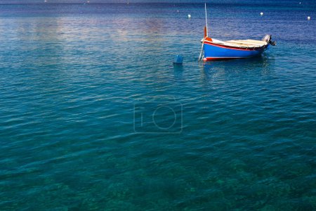 Saint Julian Bay with traditional colourful fishing Boats Luzzu, Malta
