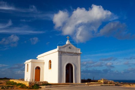 Small white catholics church, Chapel of Immaculate Conception on the seacost of Malta