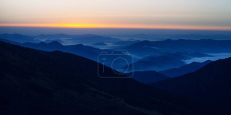 Beautiful sunrise with clouds below in Carpathian  mountains, Chornogora