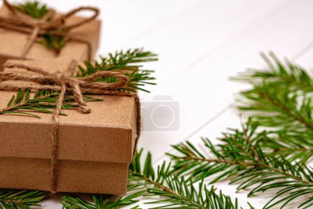 Photo for Christmas tree branches gifts - Royalty Free Image