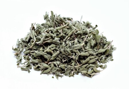 Dried herb of  Cistus incanus, known as rock rose. Traditional curative herb with many external and internal benefits, white background.