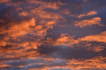 Orange, red and gray clouds in the sky