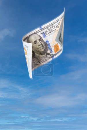 Photo for Falling or Floating $100 Bills United States Currency - Money Falling Out of the Sky. - Royalty Free Image