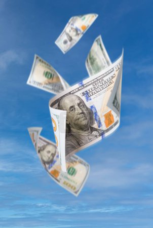 Foto de Set of Falling or Floating $100 Bills United States Currency - Money Falling Out of the Sky. - Imagen libre de derechos