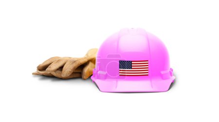 Photo for Pink Hardhat with an American Flag Decal on the Front and Gloves Isolated on White Background. - Royalty Free Image