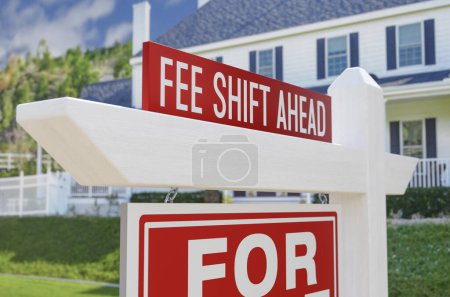 Photo for Fee Shift Ahead For Sale Real Estate Sign In Front Of New House. - Royalty Free Image