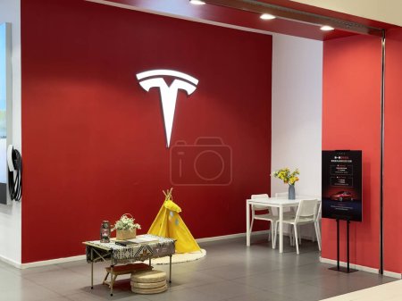 Photo for Nanning, China - Nov 4, 2023: Tesla store logo. Tesla, Inc is an American multinational automotive and clean energy company. - Royalty Free Image