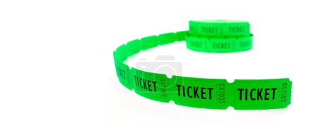 Photo for Roll of green tickets connected together for admission or entrance to activity show or entertainment - Royalty Free Image