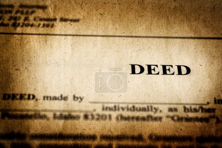 Photo for Deed to real estate transfer title ownership to land or home old weathered paper - Royalty Free Image
