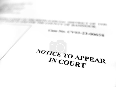 Close up of Court filing legal document Notice to Appear in Court