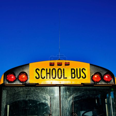 School bus blue sky lights and windshield detail