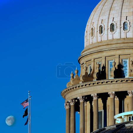 Photo for State Capitol Building governing government dome structure legal laws moon sky flags - Royalty Free Image
