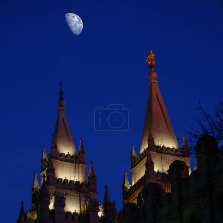 Photo for Salt Lake City Mormon LDS Latter-day Saing Temple at night with moon - Royalty Free Image