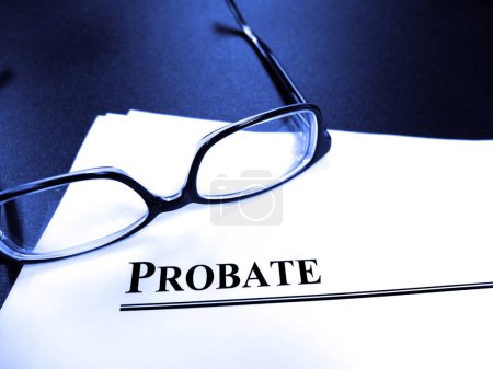 Probate last will and testament Estate Planning documents on desk with glasses