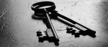 Photo for Wooden surface with keys to unlock - Royalty Free Image