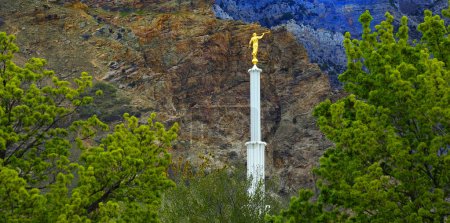 Mormon Latterday Saint LDS Temple in Provo Utah with Mountains and Trees