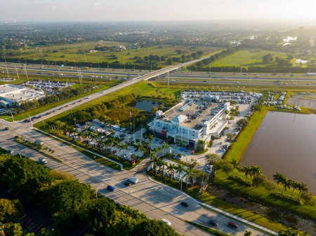 Photo for Weston, FL, USA - December 13, 2022: Aerial drone photo Nissan and Volvo automobile dealerships in Weston Florida USA - Royalty Free Image