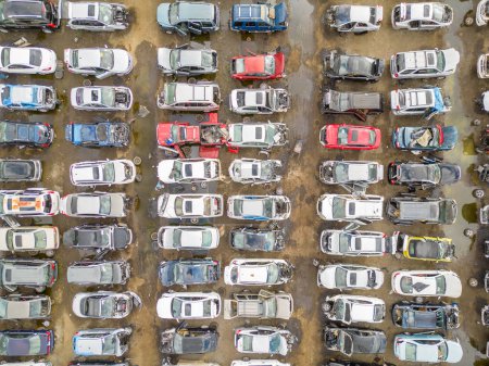 Photo for Aerial overhea shot of wrecked damaged cars at a automotive junk yard - Royalty Free Image