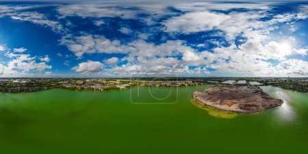 Photo for Aerial 360 equirectangular photo of a quary man made lake with green water - Royalty Free Image