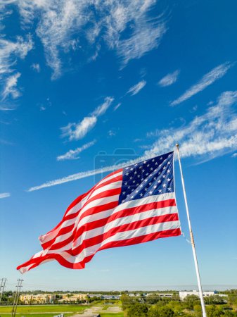 Photo for American Flag beautifully flailing blowing in the wind - Royalty Free Image