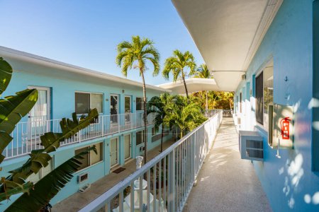 Photo for Generic Miami Beach apartment building with exterior garden view - Royalty Free Image