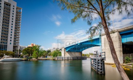 Photo for Smooth long exposure photo of the Miami River by Flagler Street - Royalty Free Image