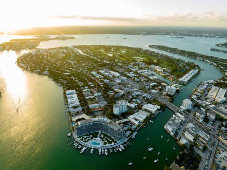 Photo for Normandy Isles Miami Beach at sunset. Aerial drone photo showing condominiums and Biscayne Bay - Royalty Free Image