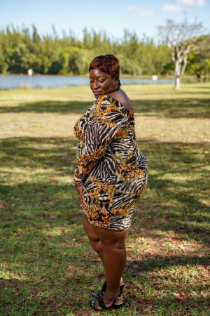 Photo for Full body photo of a plus sized model outdoors in nature - Royalty Free Image