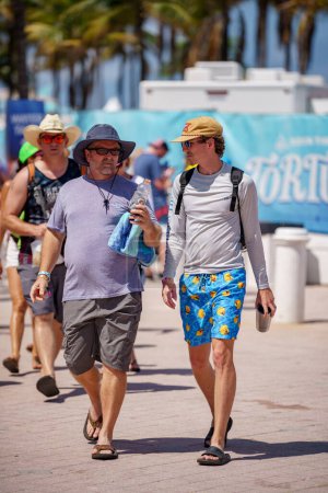 Photo for Fort Lauderdale, FL, USA - April 16, 2023: Tourists at the 2023 Tortuga Music Festival on the beach - Royalty Free Image