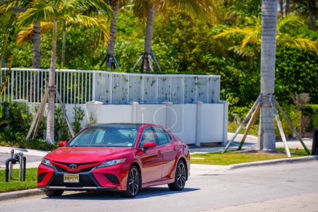 Photo for Palm Beach, FL, USA - May 11, 2023: Photo of a red Toyota Camry - Royalty Free Image