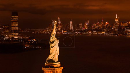 Photo for Statue of Liberty under orange fog haze from 2023 Canadian fires - Royalty Free Image