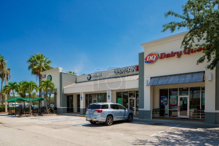 Photo for Stuart, FL, USA - July 1, 2023: Dairy Queen ice cream shop at Pineapple Commons plaza Stuart Florida - Royalty Free Image