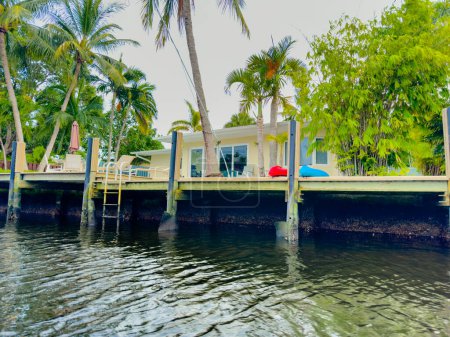 Photo for Fort Lauderdale, FL, USA.- July 6, 2023: Kayak or SUP pov of waterfront backyard homes in Fort Lauderdale Florida - Royalty Free Image