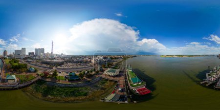 Photo for New Orleans, LA, USA - July 22, 2023: Aerial 360 vr equirectangular photo Woldenberg Park steam boats on the Mississippi River - Royalty Free Image
