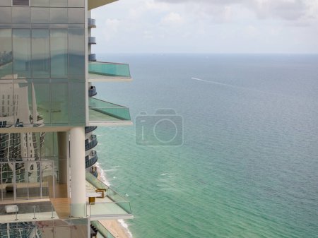 Photo for Aerial photo Miami Sunny Isles Beach building balcony overlooking the Atlantic Ocean - Royalty Free Image